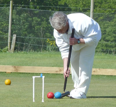 Peter Cutting (C) about to run&nbsp;hoop 3