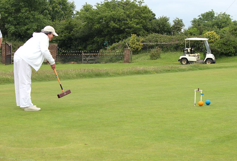 Margaret Piper knocks Peter Cutting away from 4 back