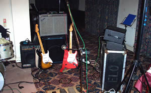  Ken's Guitars awaiting action 
